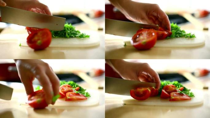 厨师正在切西红柿。