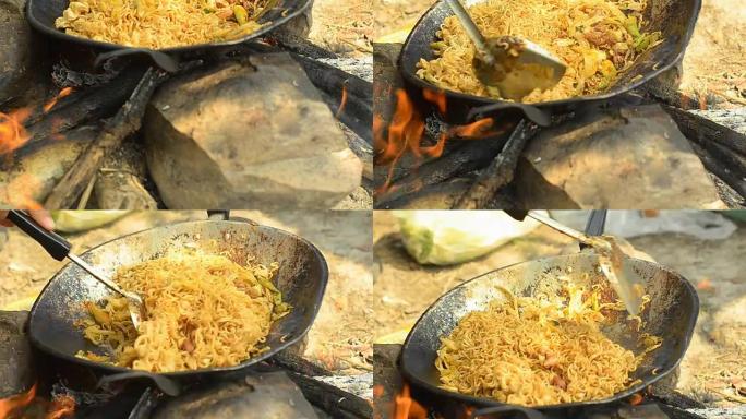 淘: 露营时在岩石上炒中式面条