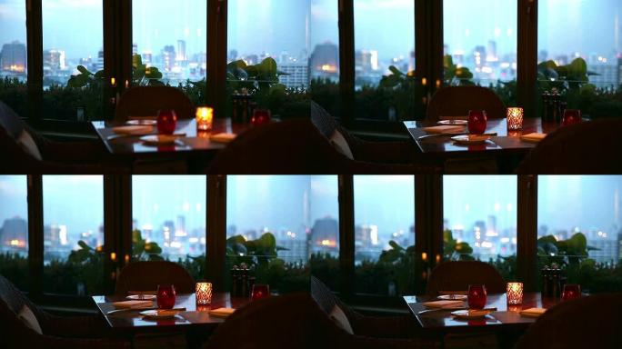 高清：以城市景观为背景的浪漫餐桌