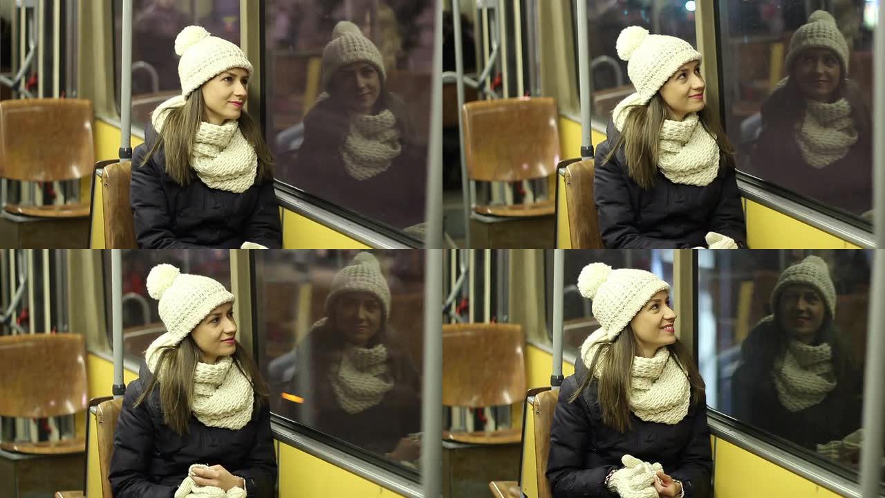 公交车上的女孩外国美女乘坐公共汽车针织帽