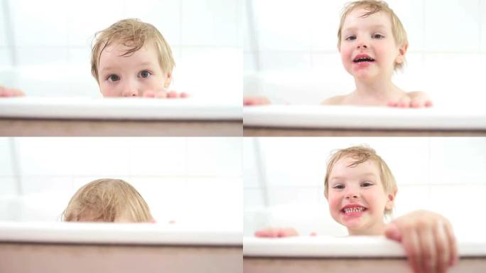 小男孩在浴缸里玩Peak-a-boo