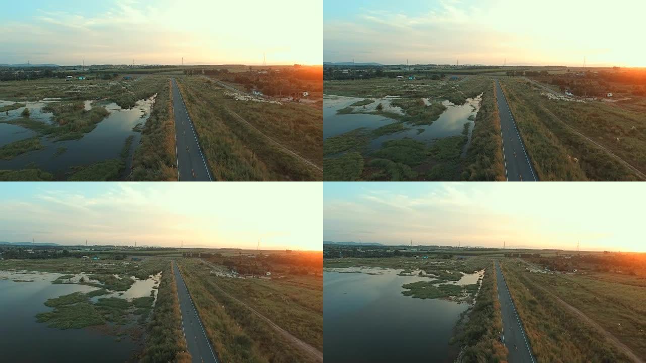 日落路上的视频。无人机拍摄马路
