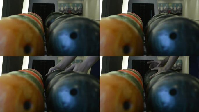 多色保龄球和机器