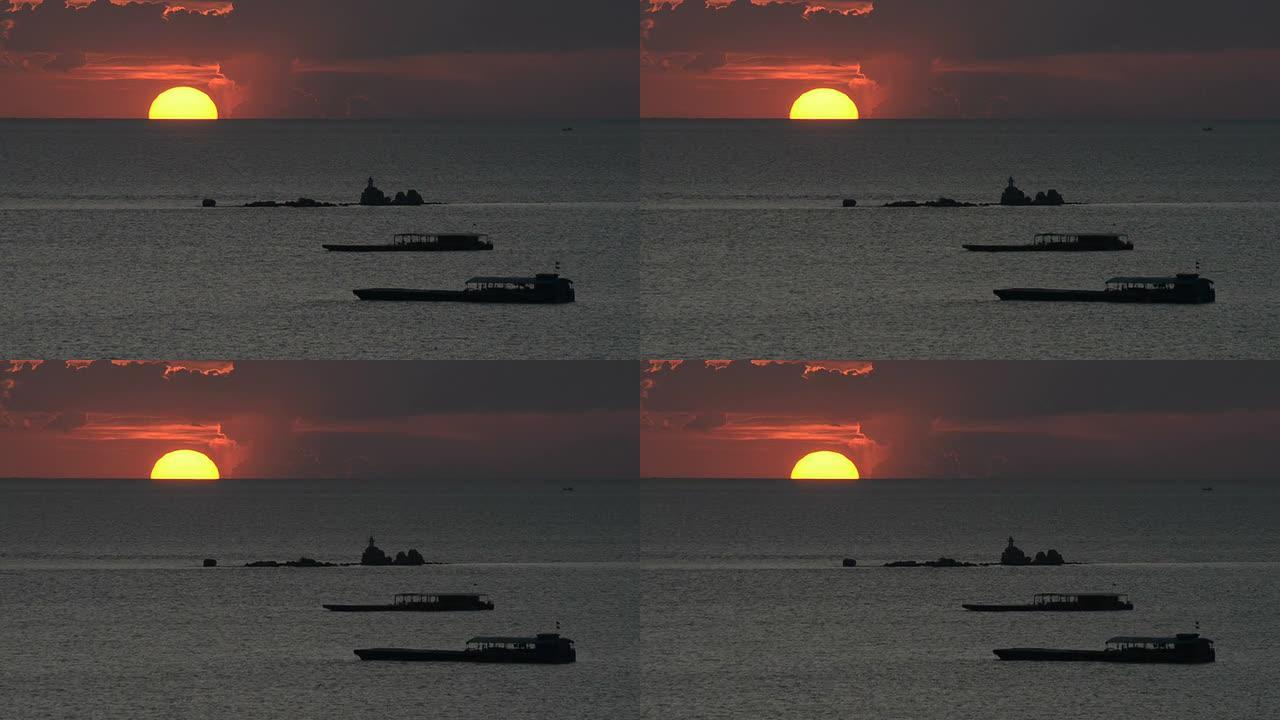 泰国芭堤雅市日落海上渔船黄昏海面落日
