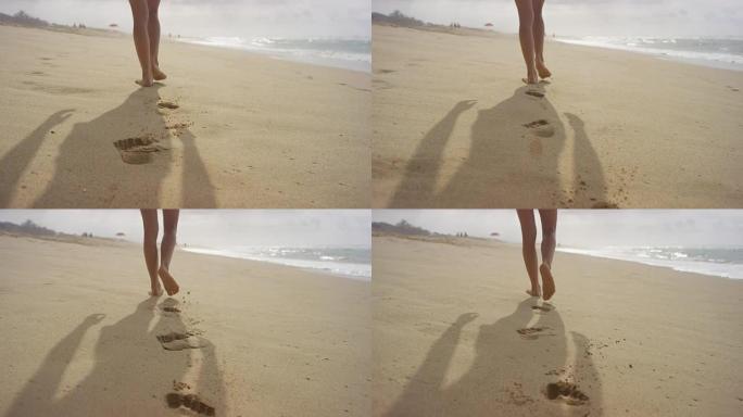 软沙中的脚步声脚印特写美腿跟随拍摄沙滩海