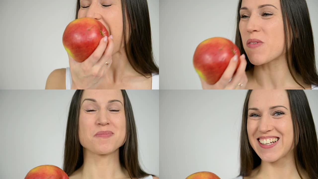 吃红色大苹果的女人