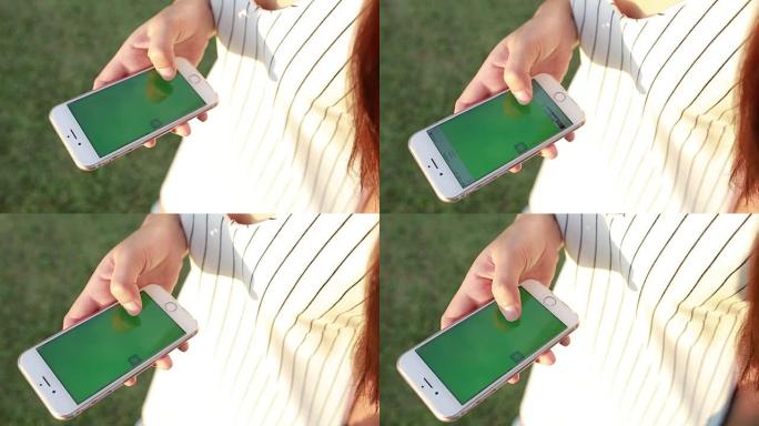 使用智能手机的亚洲女性