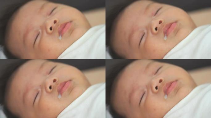 熟睡的婴儿特写熟睡的婴儿吐奶