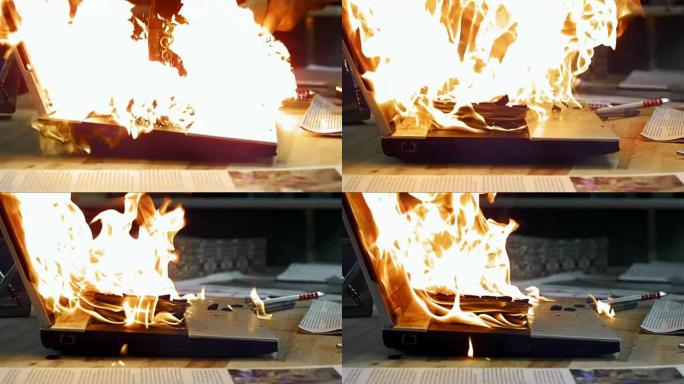 SLO MO笔记本电脑被锤子击中着火
