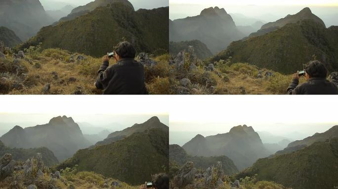 一名男子在多相岛山拍照