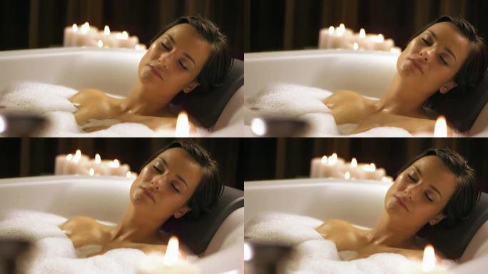 HD:美丽的女人在泡泡浴中放松
