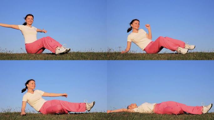 一个年轻的女人在草地上休息。