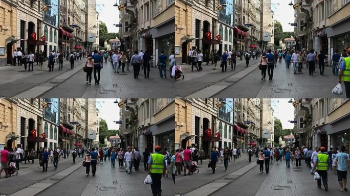 在伊斯提卡尔大街上慢镜头行走的人群