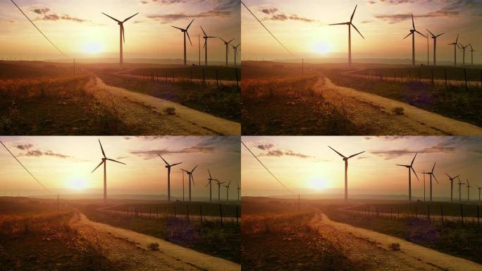 带风力涡轮机的日落景观