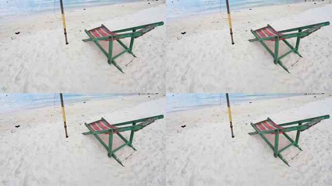 带太阳伞和床的海滩