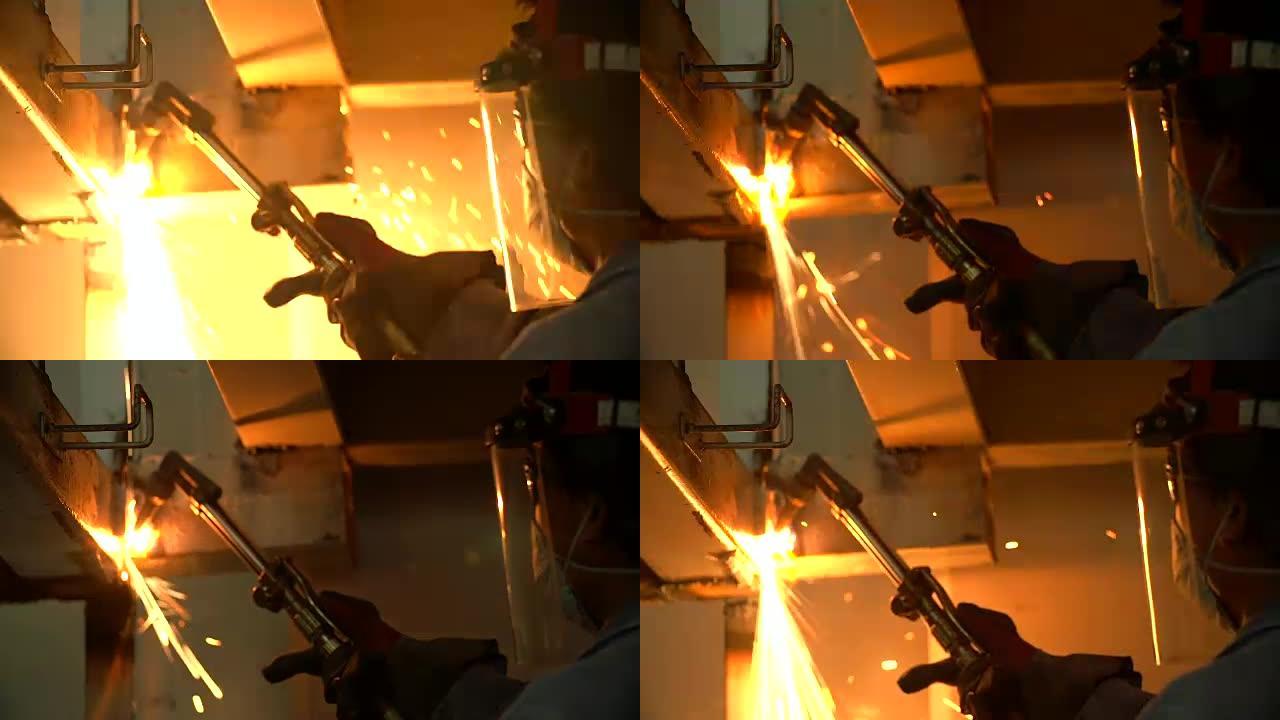 高清: 工人使用割刀切割金属的背景。