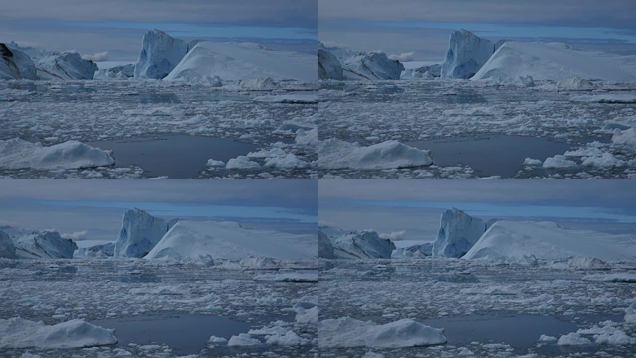 冰块在冰山前流动白冰洋冰山