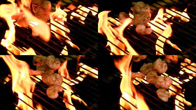 虾在燃烧的烧烤上煮熟