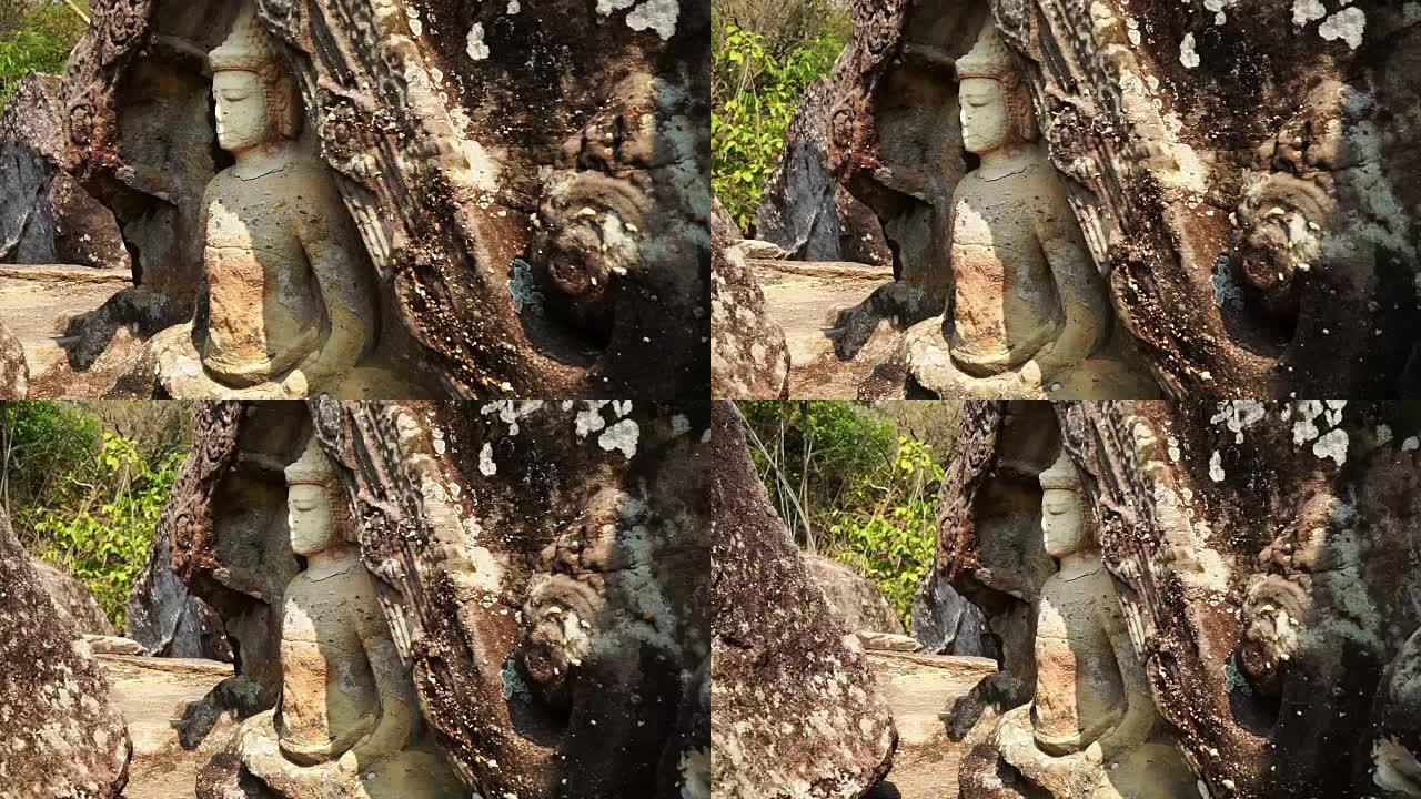 岩石中的古代佛教人物