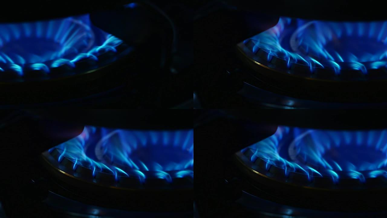 燃气灶火焰的特写蓝色灶火能源