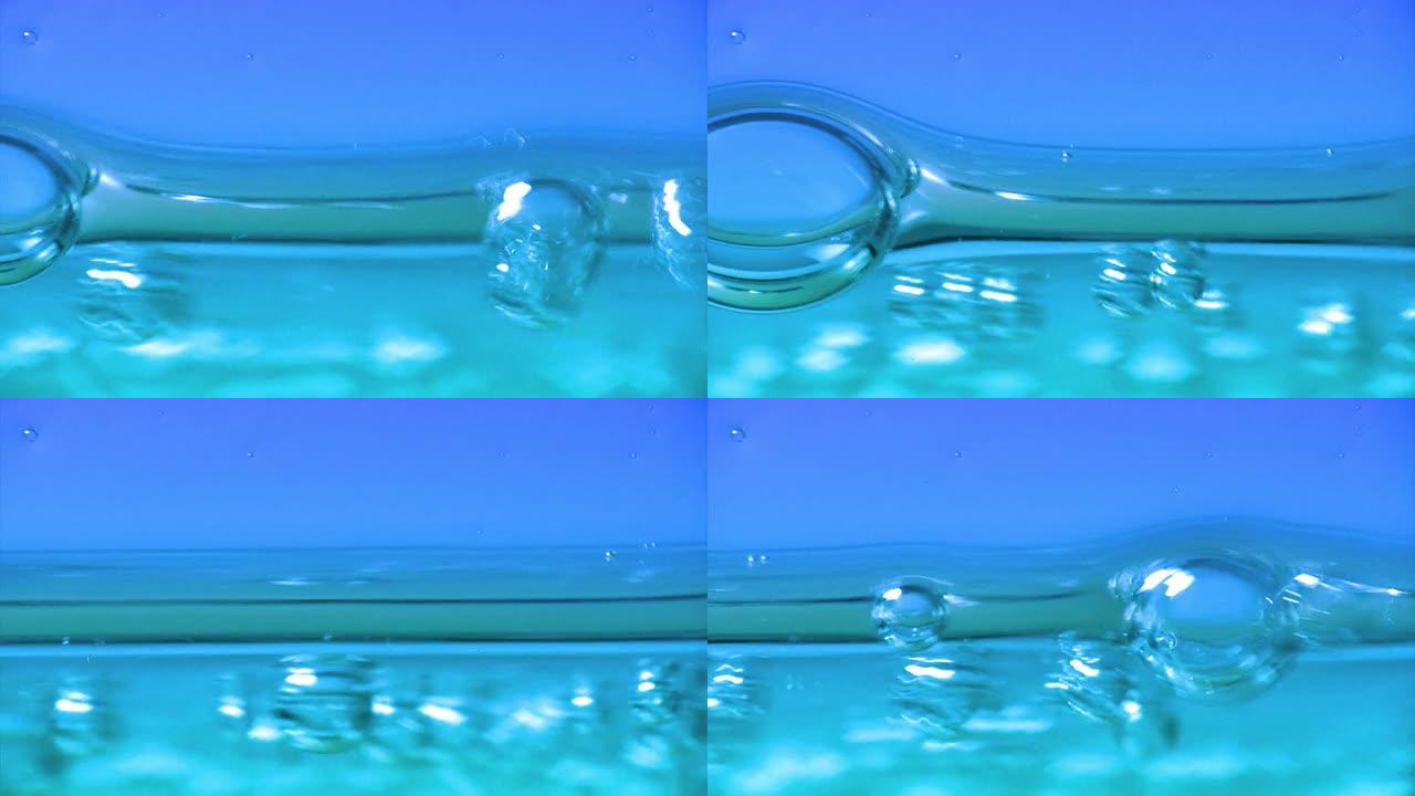 蓝色气泡，孤立的水柱
