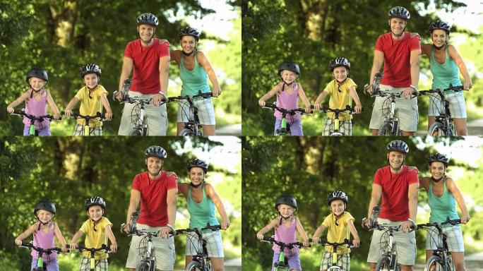 高清: 父母和他们的两个孩子骑自行车