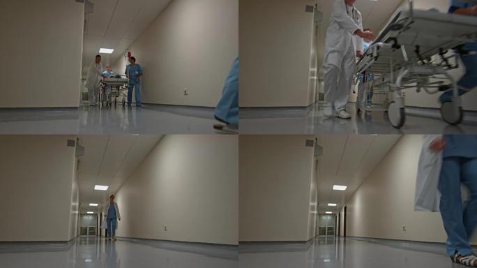 医生和两名护士将一名病人运送到手术室