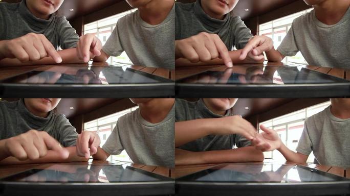 夫妇在平板电脑上的互联网购物，握手