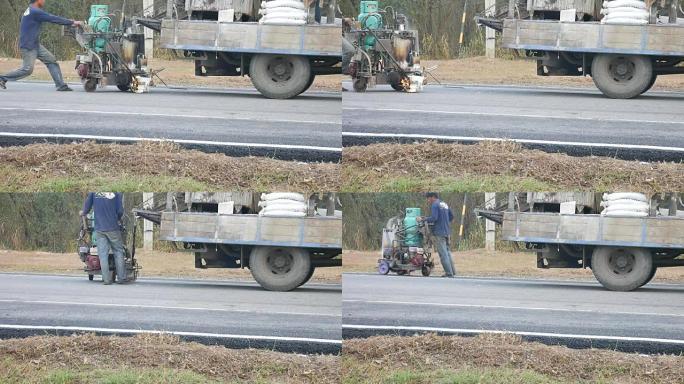 工人粉刷道路线工人粉刷道路线道路施工