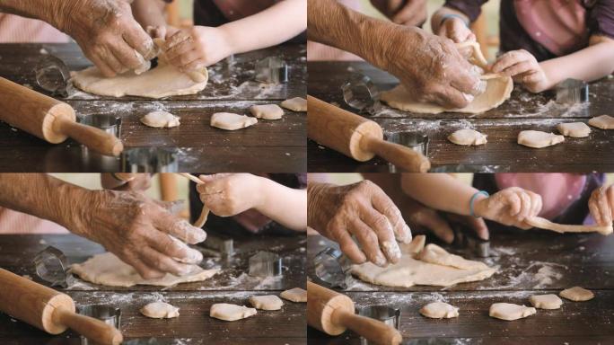 与奶奶一起烹饪美丽的小女孩学习如何在明亮的老式厨房里做饼干