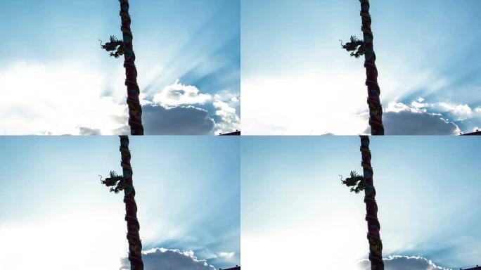 延时：中国龙图腾柱，背景是阳光和云朵
