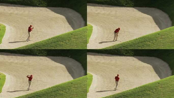 沙坑里的高尔夫球手