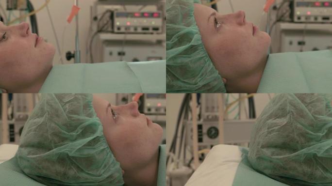 躺在手术台上的女病人