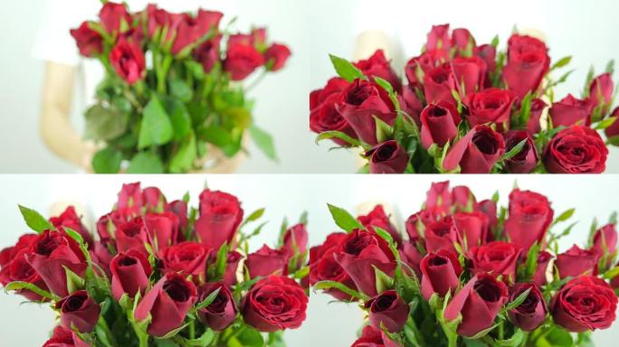 情人节那天，一位女士送了一大束红玫瑰。