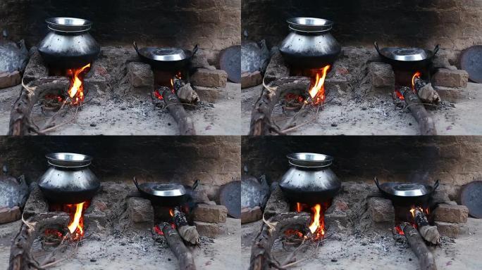农村燃木炉生火做饭户外野炊柴火饭