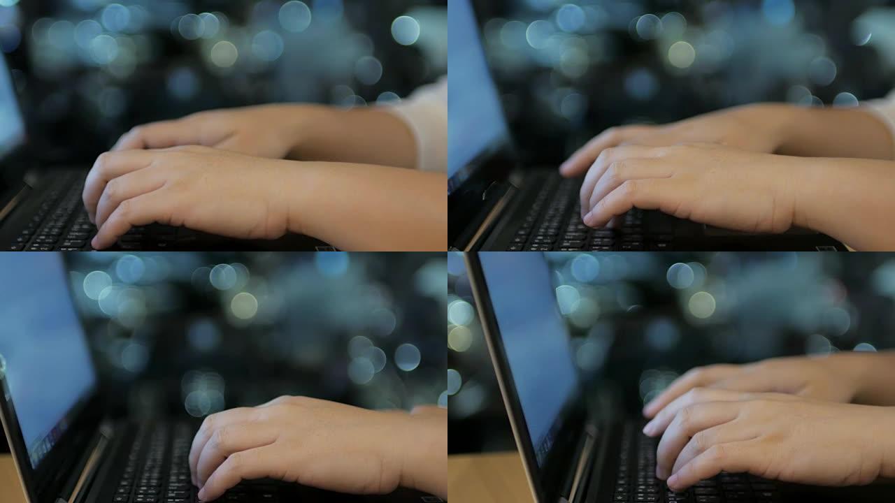 女人手在笔记本电脑键盘上打字，带圆形灯博克夜背景，4k(UHD)