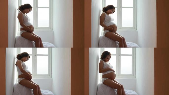 孕妇带窗户灯怀孕准妈妈孕妇大肚子摸肚子