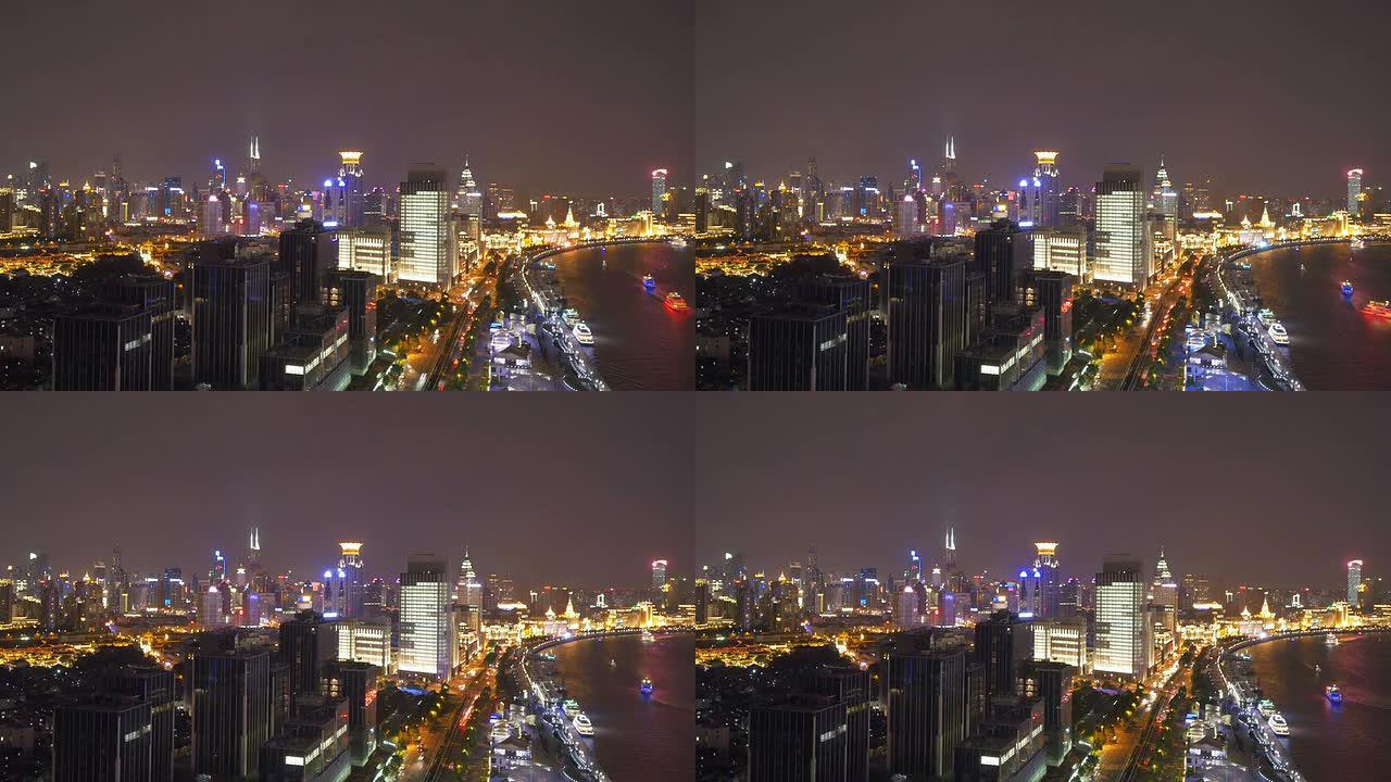 夜间，时间流逝，上海河岸的天际线和现代建筑。