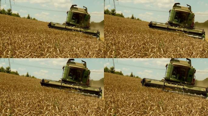 联合收割机成熟秋收小麦田现代机械化