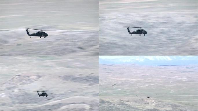 美国甜草县蒙大拿州风景鸟瞰图中的黑鹰直升机飞行揭示
