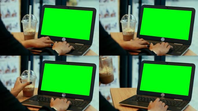 咖啡馆使用数字平板电脑触摸屏设备平板电脑的绿屏手
