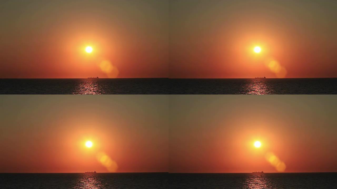 高清：日落的海洋和船