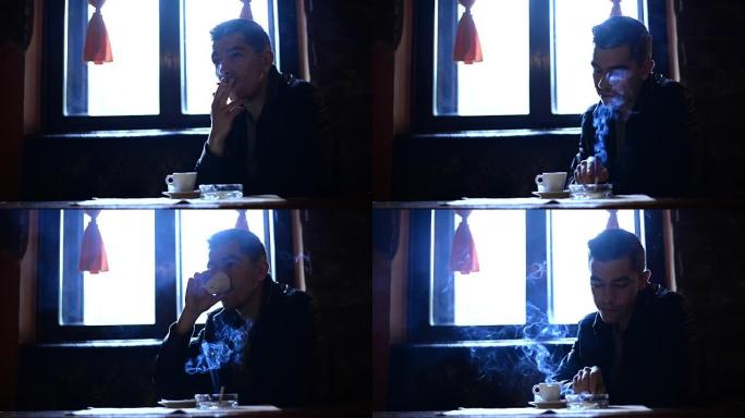 年轻人独自坐在咖啡馆里