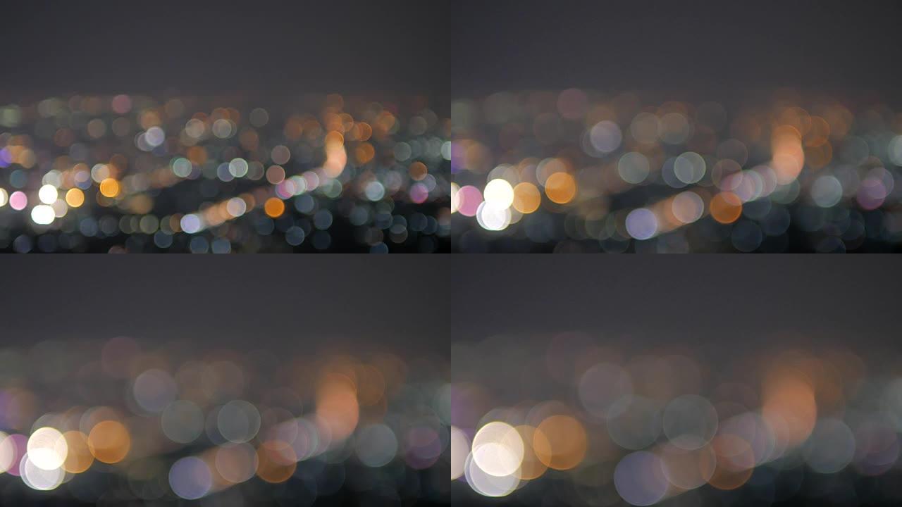 Bokeh circle light背景的城市在俯视点，4k(UHD)