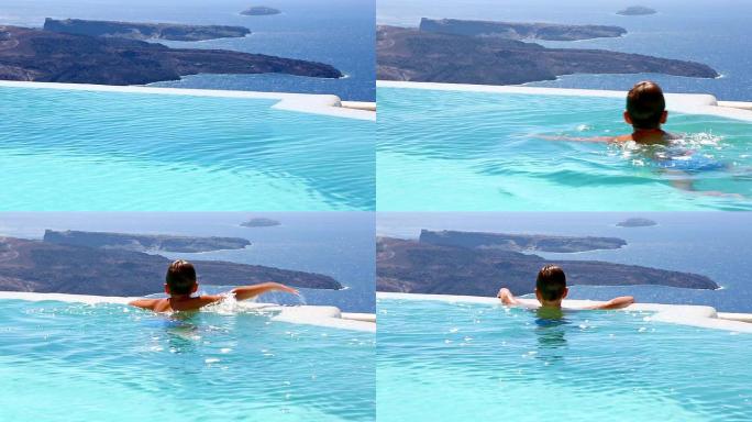 高清: 圣托里尼无限游泳池的孩子