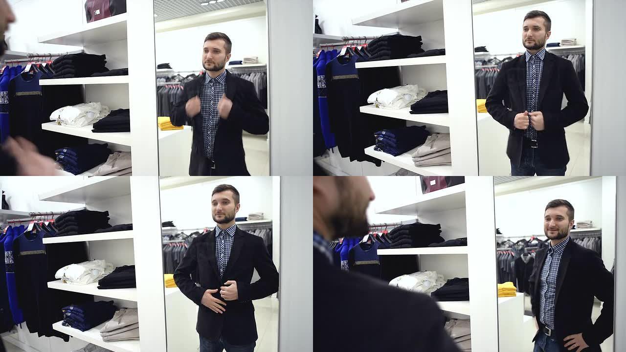 这个年轻人在商场里为自己挑选新衣服。