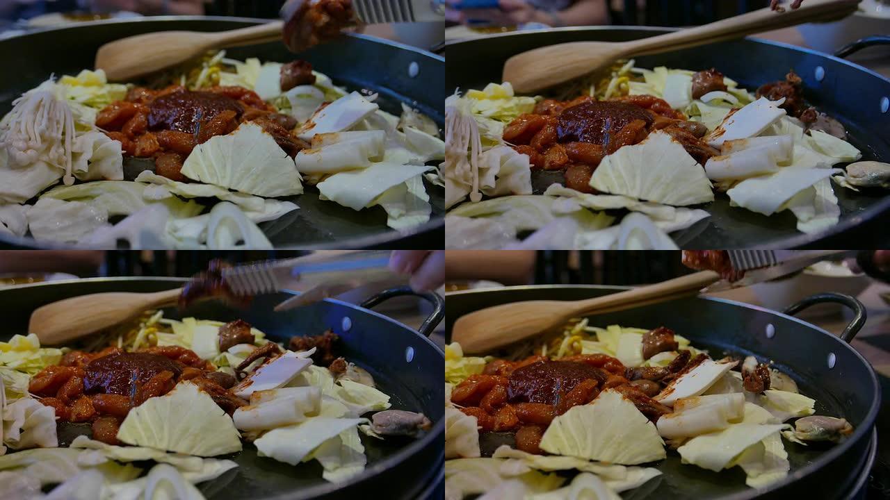 4k镜头: 韩国料理，Dak Galbi，鸡肉炒饭和海鲜酱