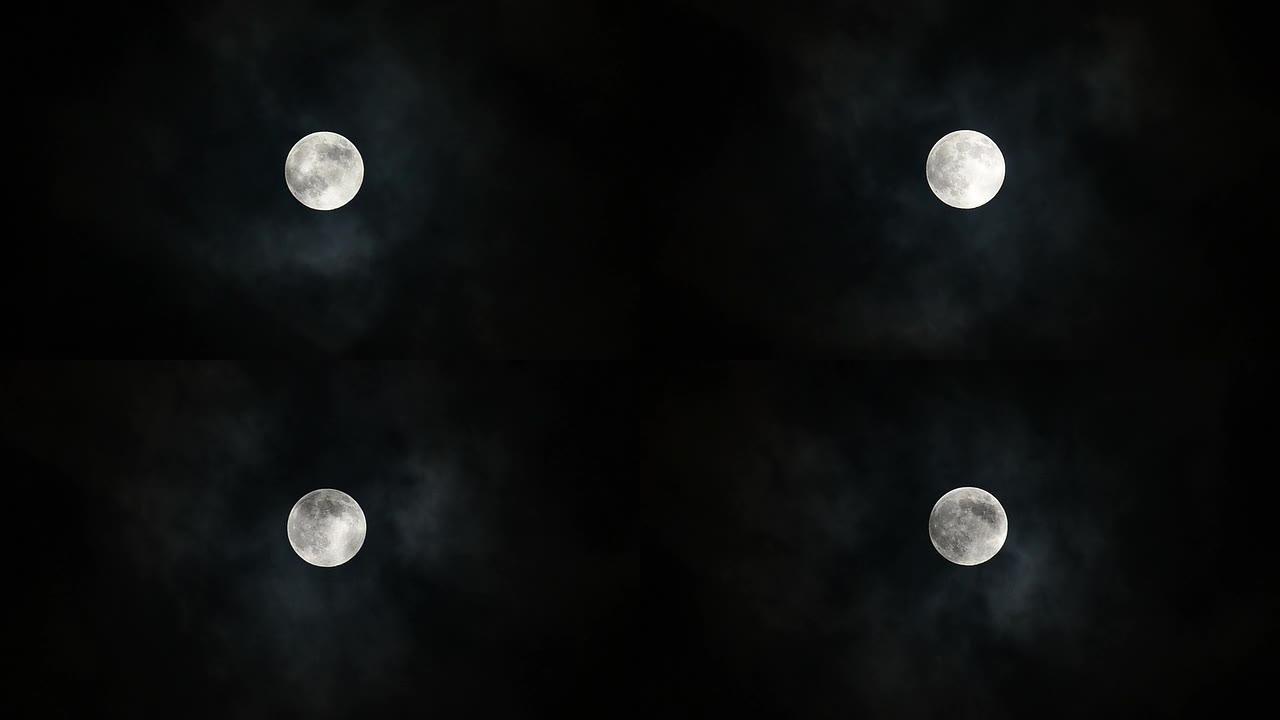 夜晚云层后面的满月