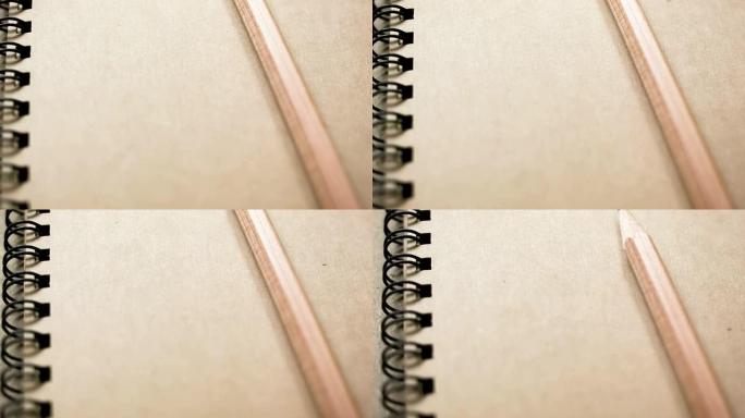 空白笔记本和木制铅笔