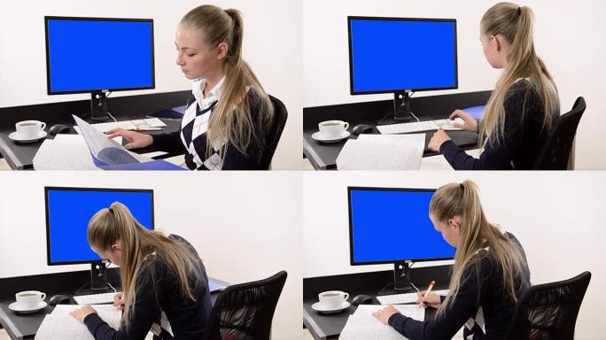 在办公室工作的年轻女商人